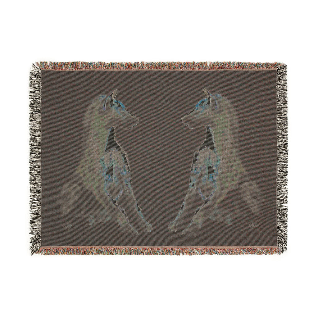 Woven blanket featuring illustrated hyena pups in a cozy wildlife-inspired design with warm earthy tones and detailed animal artwork. Soft statement blanket with nature lover aesthetic, safari inspired decor, whimsical wildlife art, maximalist home decor, indie illustration style, cozy cottagecore vibe, and expressive alternative decor perfect for bedrooms, reading nooks, couches, gifts, and colorful eclectic living spaces.