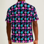 Button-down shirt featuring a colorful polyhedral dice pattern in an all-over tabletop gaming inspired print. Lightweight statement shirt with nerdy maximalist aesthetic, tabletop RPG fashion, Dungeons and Dragons inspired style, indie streetwear, expressive queer friendly fashion, whimsical gamer apparel, retro novelty print, artsy casualwear, and playful alternative clothing perfect for conventions, game nights, festivals, vacations, and everyday geek fashion.