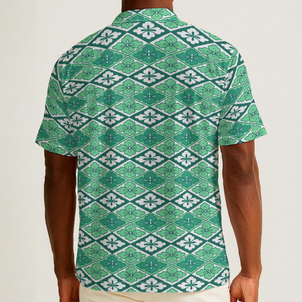 Button-down shirt featuring the Bloomgrid in Mint Mojito pattern with mint green, cream, and citrus-toned geometric floral shapes in a retro-inspired all-over print. Lightweight summer button down with coastal resort aesthetic, vintage Palm Springs style, botanical geometric pattern, maximalist fashion, indie streetwear, colorful vacation outfit, mod inspired design, artsy casualwear, breezy resortwear, expressive fashion, queer friendly style, and playful retro clothing perfect for beach vacations, brunch,