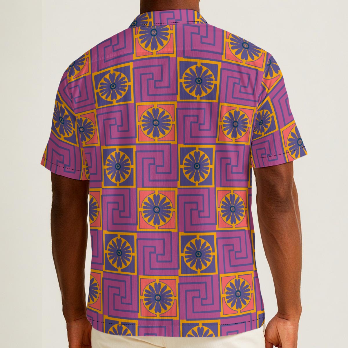 Button-down shirt featuring the Petal Circuit in Disco Fig pattern with bold purple, pink, orange, and cream geometric floral shapes in a retro-inspired all-over print. Lightweight statement shirt with maximalist fashion aesthetic, vintage resort style, mod inspired pattern, psychedelic floral design, indie streetwear, colorful vacation outfit vibe, expressive queer friendly fashion, artsy casualwear, retro geometric clothing, playful summer button down, and breezy resortwear perfect for festivals, travel