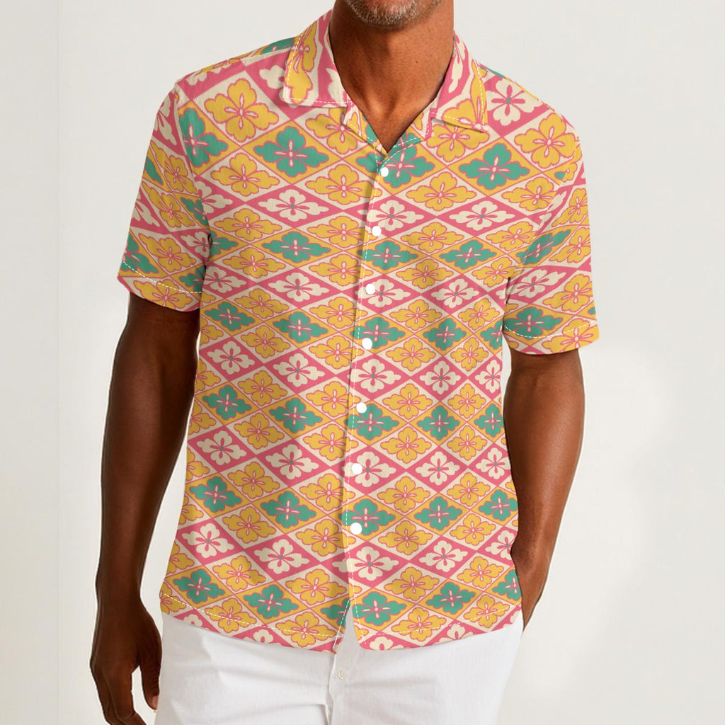Button-down shirt featuring the Bloomgrid in Candy Cabana pattern with vibrant pink, coral, cream, and mint geometric floral shapes in a playful retro-inspired all-over print. Lightweight summer button down with maximalist fashion aesthetic, vintage resort style, tropical vacation outfit vibe, Palm Springs inspired design, colorful geometric floral pattern, indie fashion, artsy streetwear, mod inspired clothing, expressive queer friendly fashion, retro beachwear, statement summer shirt, and breezy resortwea
