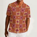 Button-down shirt featuring the Petal Circuit in Mulled Spice pattern with warm rust, cream, plum, and golden geometric floral shapes in a retro-inspired all-over print. Lightweight statement shirt with vintage autumn aesthetic, maximalist fashion, indie streetwear, mod inspired design, expressive queer friendly style, artsy casualwear, and colorful resortwear perfect for festivals, travel, brunch, concerts, and everyday alternative summer wear.