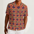 Button-down shirt featuring the Bloomgrid in Disco Dahlia pattern with vibrant pink, orange, and cream geometric floral shapes in a retro-inspired all-over print. Colorful statement shirt with maximalist fashion aesthetic, vintage resort style, mod inspired pattern, artsy streetwear, retro floral design, indie fashion, bold vacation outfit, short sleeve summer button down, playful geometric print, expressive fashion, queer friendly style, and lightweight resortwear perfect for festivals, travel, beach vacat