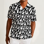 Button-down shirt featuring a playful black-and-white ghost pattern in an all-over spooky print design. Lightweight summer shirt with spooky cute aesthetic, vintage Halloween style, alternative fashion, indie streetwear, whimsical ghost artwork, expressive queer friendly fashion, retro novelty print, artsy casualwear, and statement resortwear perfect for festivals, concerts, Halloween parties, vacations, brunch, and everyday alternative wear.