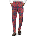 Dress pants featuring the Petalburst Tile in Midnight Fiesta pattern with bold floral-inspired geometric shapes in rich midnight blue, orange, pink, and cream tones. Statement trousers with retro maximalist aesthetic, indie streetwear, mod inspired fashion, expressive queer friendly style, artsy alternative clothing, colorful geometric pattern, and bold patterned pants perfect for concerts, parties, festivals, creative workwear, nightlife, and everyday alternative fashion.