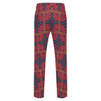Dress pants featuring the Petalburst Tile in Midnight Fiesta pattern with bold floral-inspired geometric shapes in rich midnight blue, orange, pink, and cream tones. Statement trousers with retro maximalist aesthetic, indie streetwear, mod inspired fashion, expressive queer friendly style, artsy alternative clothing, colorful geometric pattern, and bold patterned pants perfect for concerts, parties, festivals, creative workwear, nightlife, and everyday alternative fashion.