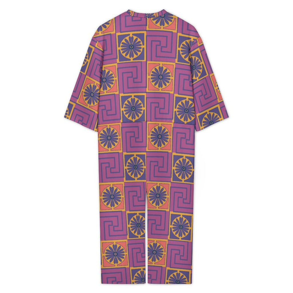 3/4 sleeve jumpsuit featuring the Petal Circuit in Disco Fig pattern with bold purple, pink, orange, and cream geometric floral shapes in a retro-inspired all-over print. Relaxed statement outfit with maximalist fashion aesthetic, indie streetwear, mod inspired design, expressive queer friendly fashion, artsy casualwear, colorful geometric artwork, and playful alternative clothing perfect for festivals, vacations, brunch, concerts, creative everyday wear, and bold summer outfits.