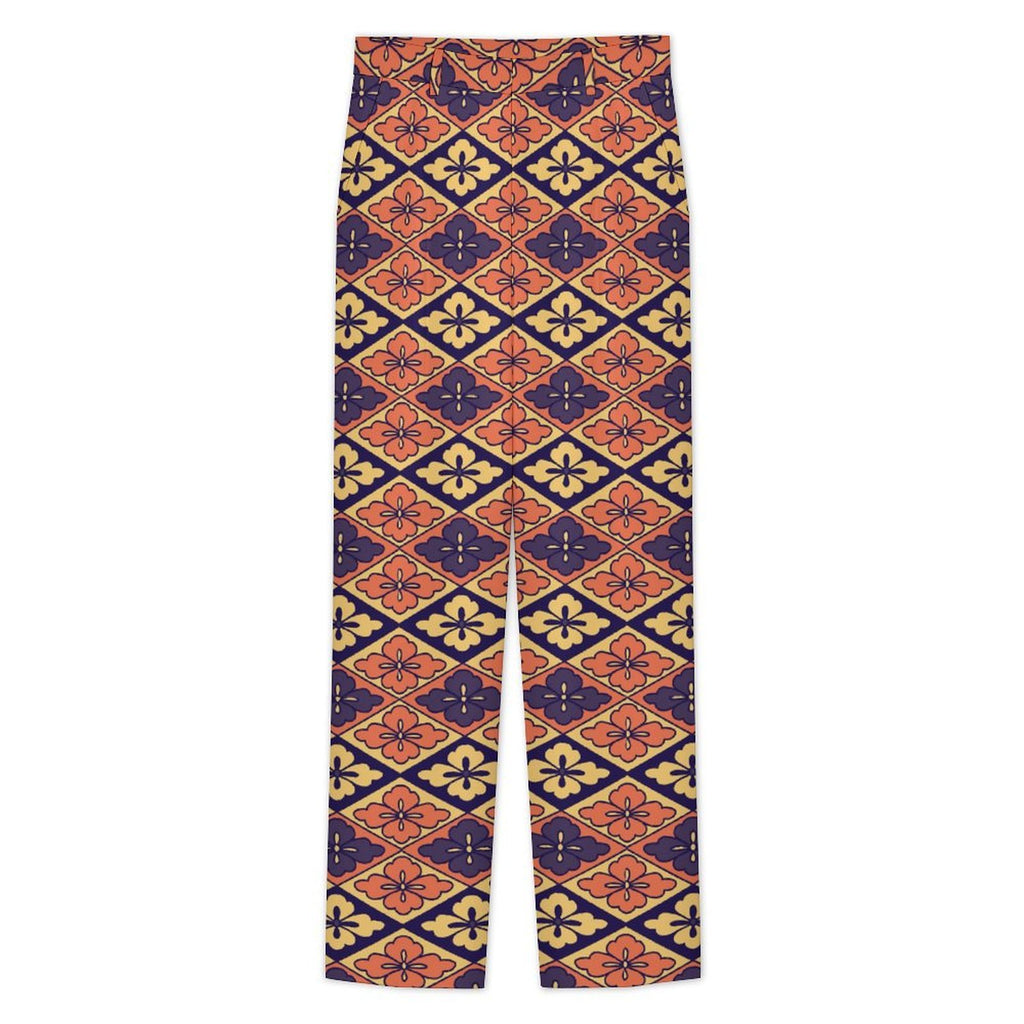 Dress pants featuring the Bloomgrid in Disco Dahlia pattern with vibrant pink, orange, and cream geometric floral shapes in a retro-inspired all-over print. Statement trousers with maximalist fashion aesthetic, mod inspired style, indie streetwear, expressive queer friendly fashion, colorful geometric artwork, artsy alternative clothing, retro resort vibe, and bold patterned pants perfect for concerts, festivals, nightlife, creative workwear, parties, and everyday alternative fashion.
