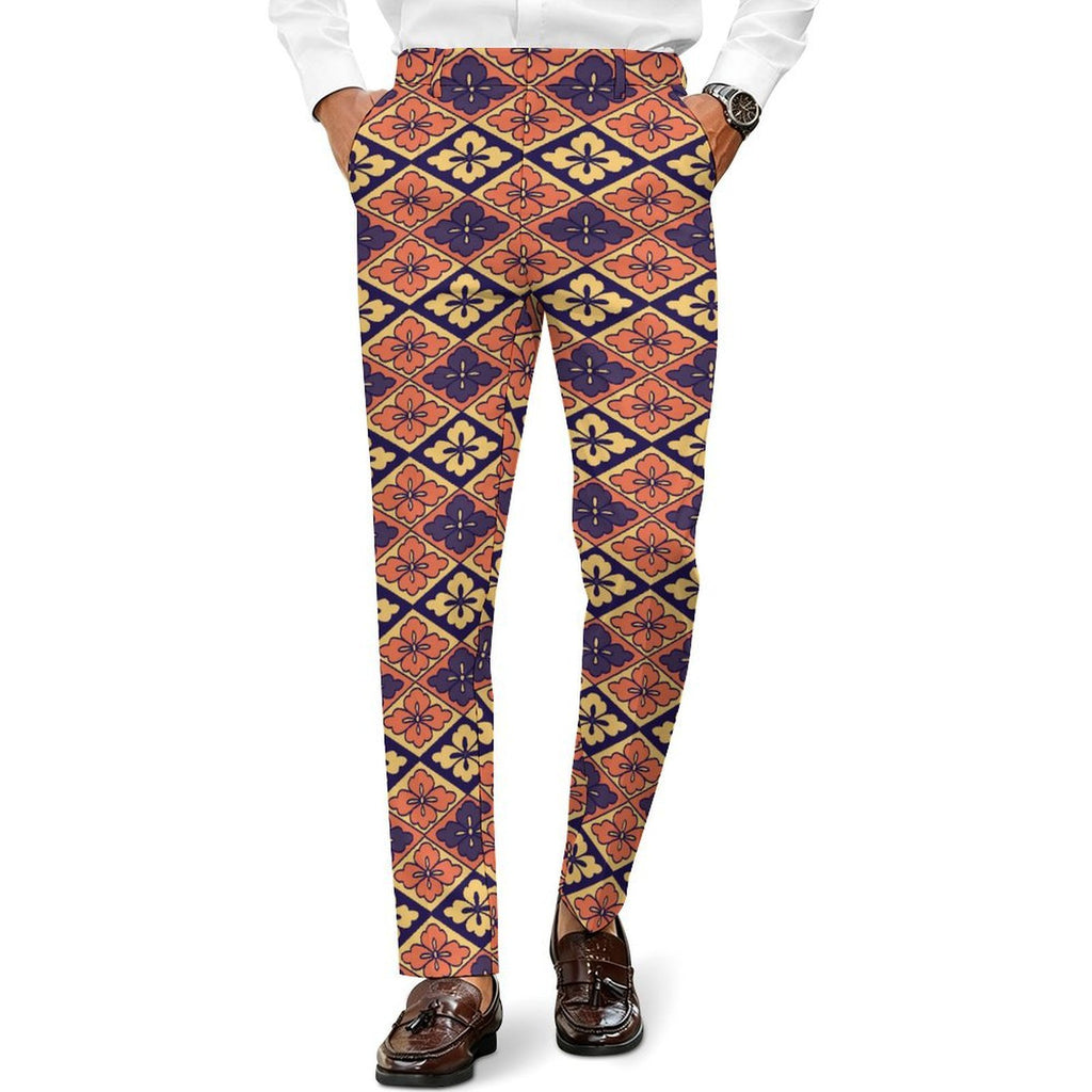 Dress pants featuring the Bloomgrid in Disco Dahlia pattern with vibrant pink, orange, and cream geometric floral shapes in a retro-inspired all-over print. Statement trousers with maximalist fashion aesthetic, mod inspired style, indie streetwear, expressive queer friendly fashion, colorful geometric artwork, artsy alternative clothing, retro resort vibe, and bold patterned pants perfect for concerts, festivals, nightlife, creative workwear, parties, and everyday alternative fashion.