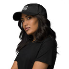 Black dad hat embroidered with the word ‘HAG’ in ornate vintage gothic lettering. Alternative fashion accessory with queer streetwear aesthetic, witchy fashion, sarcastic humor, feminist style, indie fashion, spooky cute apparel, gothic embroidery, punk inspired streetwear, adjustable baseball cap, casual everyday alternative outfit, internet humor fashion, artsy accessory, and edgy statement hat for concerts, festivals, casual wear, and alternative wardrobes.