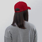 Black dad hat embroidered with the word ‘HAG’ in ornate vintage gothic lettering. Alternative fashion accessory with queer streetwear aesthetic, witchy fashion, sarcastic humor, feminist style, indie fashion, spooky cute apparel, gothic embroidery, punk inspired streetwear, adjustable baseball cap, casual everyday alternative outfit, internet humor fashion, artsy accessory, and edgy statement hat for concerts, festivals, casual wear, and alternative wardrobes.