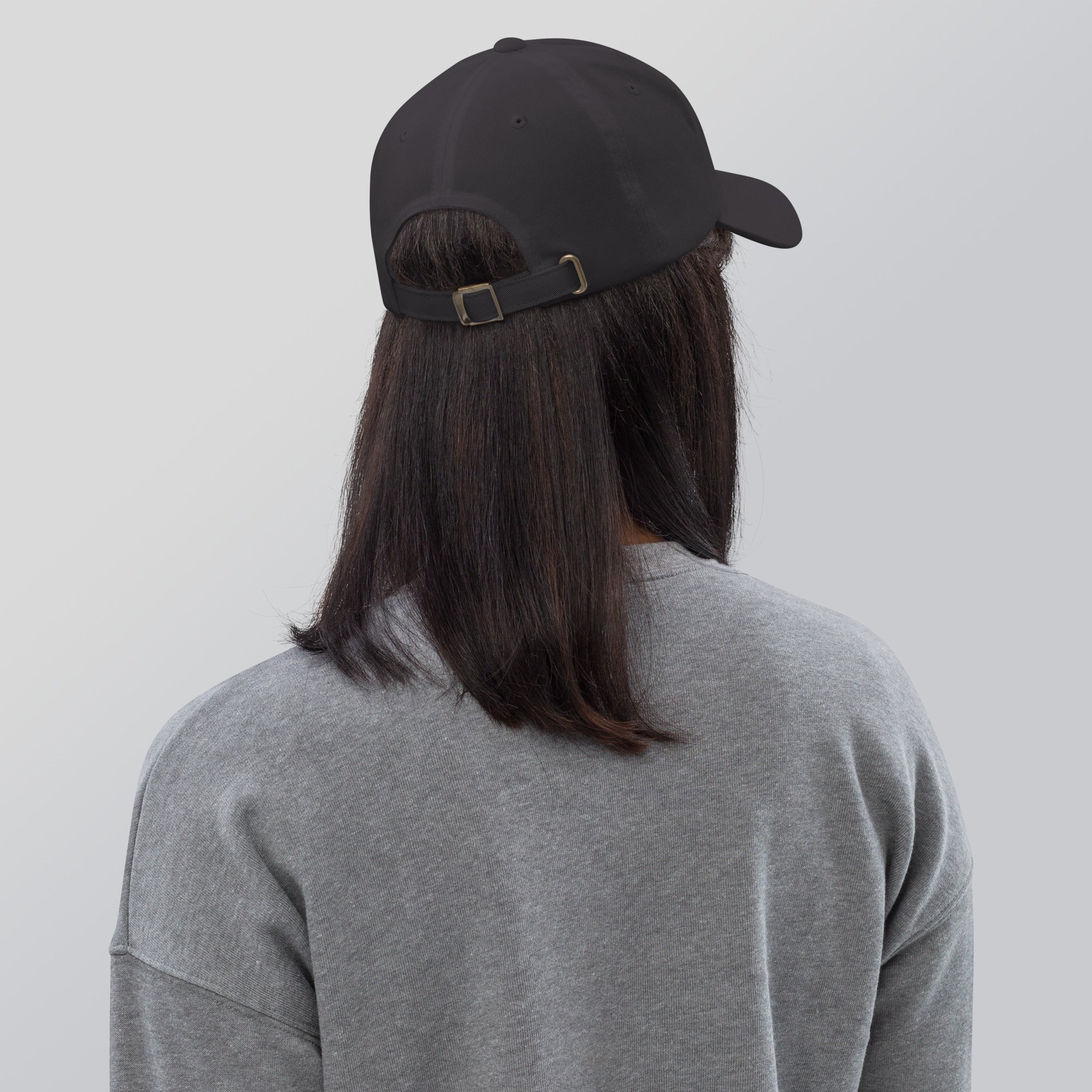 Black dad hat embroidered with the word ‘HAG’ in ornate vintage gothic lettering. Alternative fashion accessory with queer streetwear aesthetic, witchy fashion, sarcastic humor, feminist style, indie fashion, spooky cute apparel, gothic embroidery, punk inspired streetwear, adjustable baseball cap, casual everyday alternative outfit, internet humor fashion, artsy accessory, and edgy statement hat for concerts, festivals, casual wear, and alternative wardrobes.