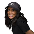 Black dad hat embroidered with the word ‘HAG’ in ornate vintage gothic lettering. Alternative fashion accessory with queer streetwear aesthetic, witchy fashion, sarcastic humor, feminist style, indie fashion, spooky cute apparel, gothic embroidery, punk inspired streetwear, adjustable baseball cap, casual everyday alternative outfit, internet humor fashion, artsy accessory, and edgy statement hat for concerts, festivals, casual wear, and alternative wardrobes.
