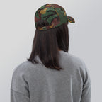 Black dad hat embroidered with the word ‘HAG’ in ornate vintage gothic lettering. Alternative fashion accessory with queer streetwear aesthetic, witchy fashion, sarcastic humor, feminist style, indie fashion, spooky cute apparel, gothic embroidery, punk inspired streetwear, adjustable baseball cap, casual everyday alternative outfit, internet humor fashion, artsy accessory, and edgy statement hat for concerts, festivals, casual wear, and alternative wardrobes.