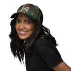 Black dad hat embroidered with the word ‘HAG’ in ornate vintage gothic lettering. Alternative fashion accessory with queer streetwear aesthetic, witchy fashion, sarcastic humor, feminist style, indie fashion, spooky cute apparel, gothic embroidery, punk inspired streetwear, adjustable baseball cap, casual everyday alternative outfit, internet humor fashion, artsy accessory, and edgy statement hat for concerts, festivals, casual wear, and alternative wardrobes.