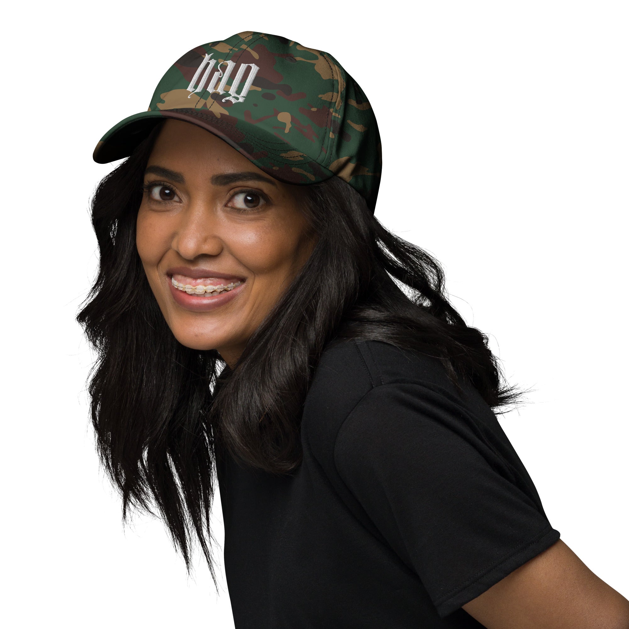 Black dad hat embroidered with the word ‘HAG’ in ornate vintage gothic lettering. Alternative fashion accessory with queer streetwear aesthetic, witchy fashion, sarcastic humor, feminist style, indie fashion, spooky cute apparel, gothic embroidery, punk inspired streetwear, adjustable baseball cap, casual everyday alternative outfit, internet humor fashion, artsy accessory, and edgy statement hat for concerts, festivals, casual wear, and alternative wardrobes.