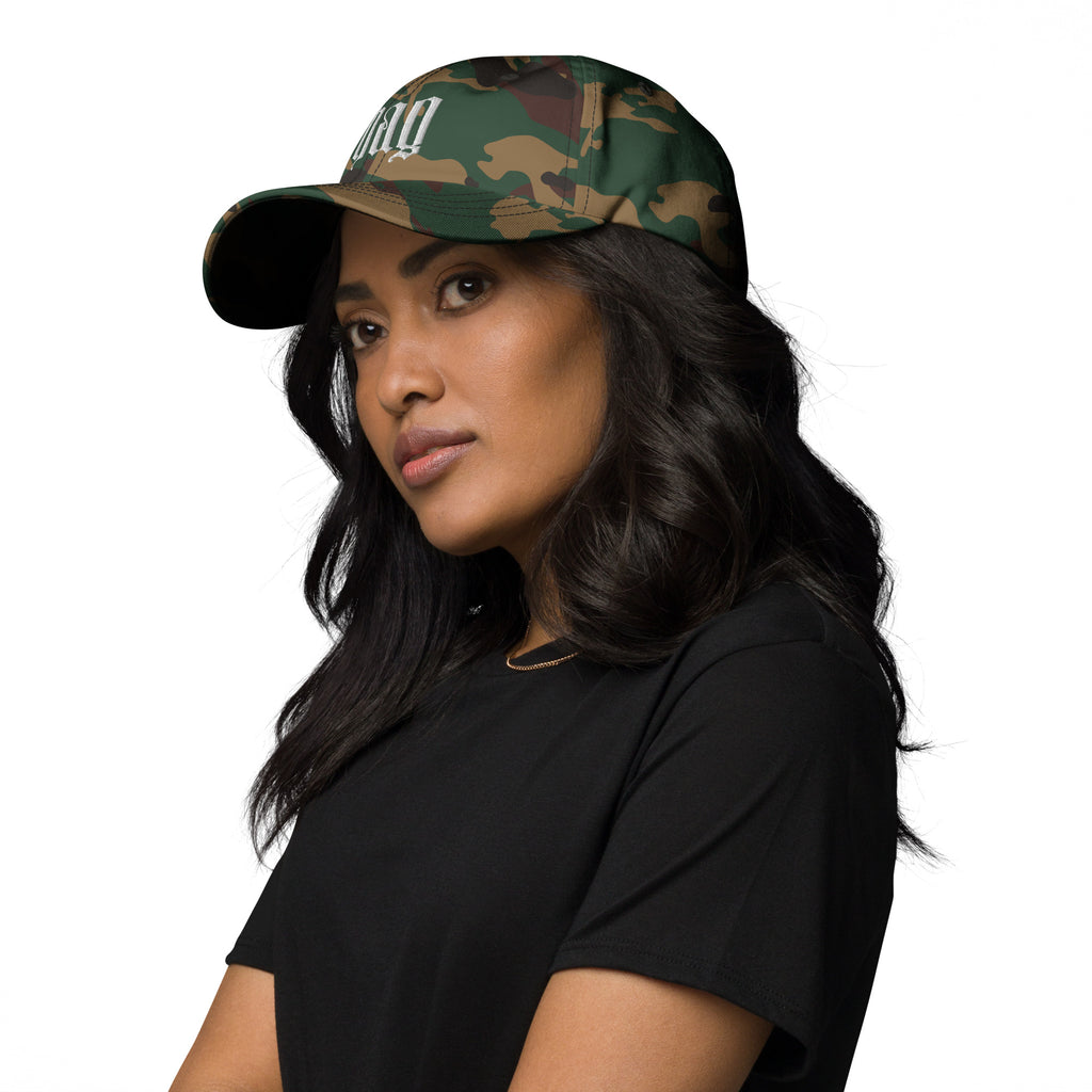 Black dad hat embroidered with the word ‘HAG’ in ornate vintage gothic lettering. Alternative fashion accessory with queer streetwear aesthetic, witchy fashion, sarcastic humor, feminist style, indie fashion, spooky cute apparel, gothic embroidery, punk inspired streetwear, adjustable baseball cap, casual everyday alternative outfit, internet humor fashion, artsy accessory, and edgy statement hat for concerts, festivals, casual wear, and alternative wardrobes.