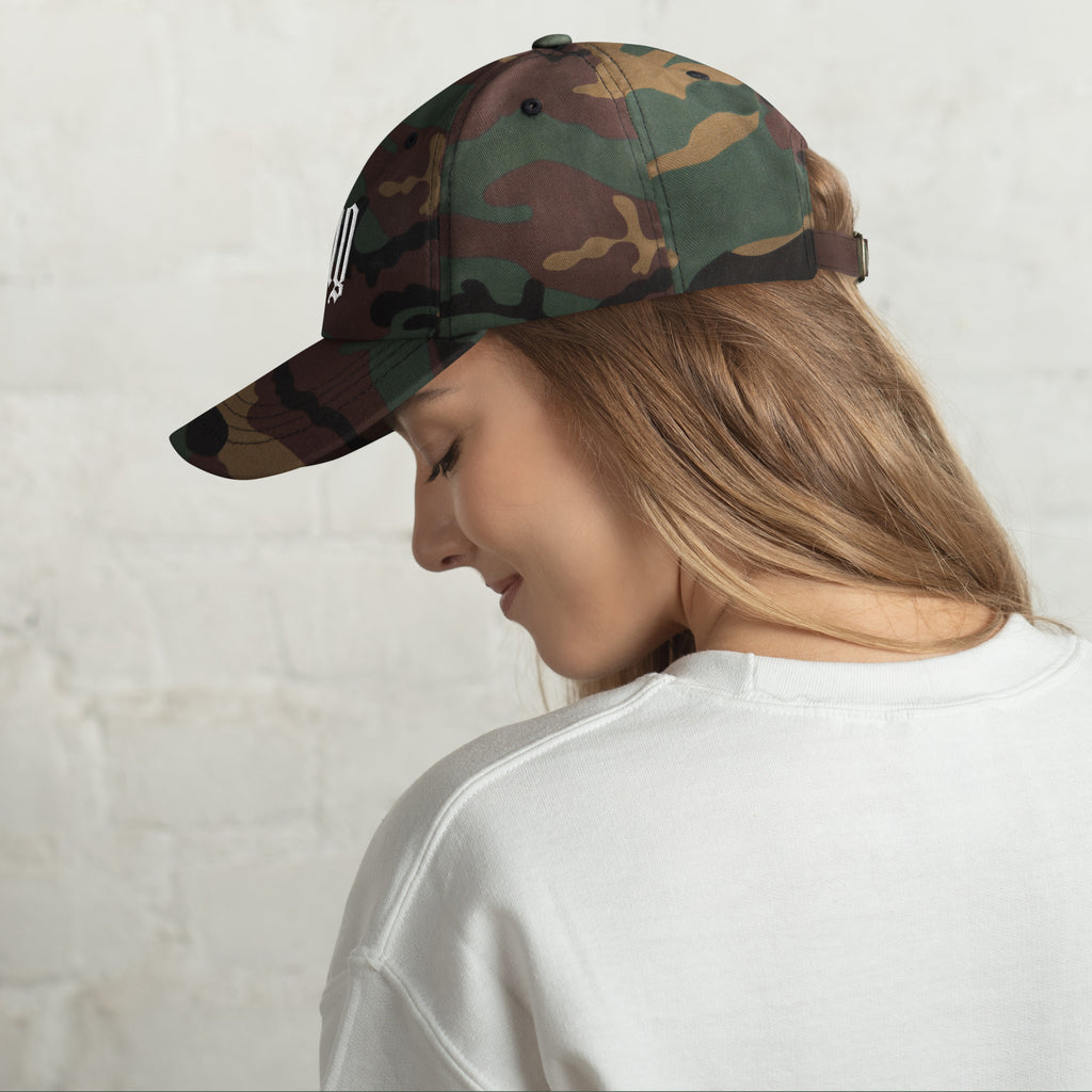 Black dad hat embroidered with the word ‘HAG’ in ornate vintage gothic lettering. Alternative fashion accessory with queer streetwear aesthetic, witchy fashion, sarcastic humor, feminist style, indie fashion, spooky cute apparel, gothic embroidery, punk inspired streetwear, adjustable baseball cap, casual everyday alternative outfit, internet humor fashion, artsy accessory, and edgy statement hat for concerts, festivals, casual wear, and alternative wardrobes.
