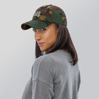 Black dad hat embroidered with the word ‘HAG’ in ornate vintage gothic lettering. Alternative fashion accessory with queer streetwear aesthetic, witchy fashion, sarcastic humor, feminist style, indie fashion, spooky cute apparel, gothic embroidery, punk inspired streetwear, adjustable baseball cap, casual everyday alternative outfit, internet humor fashion, artsy accessory, and edgy statement hat for concerts, festivals, casual wear, and alternative wardrobes.
