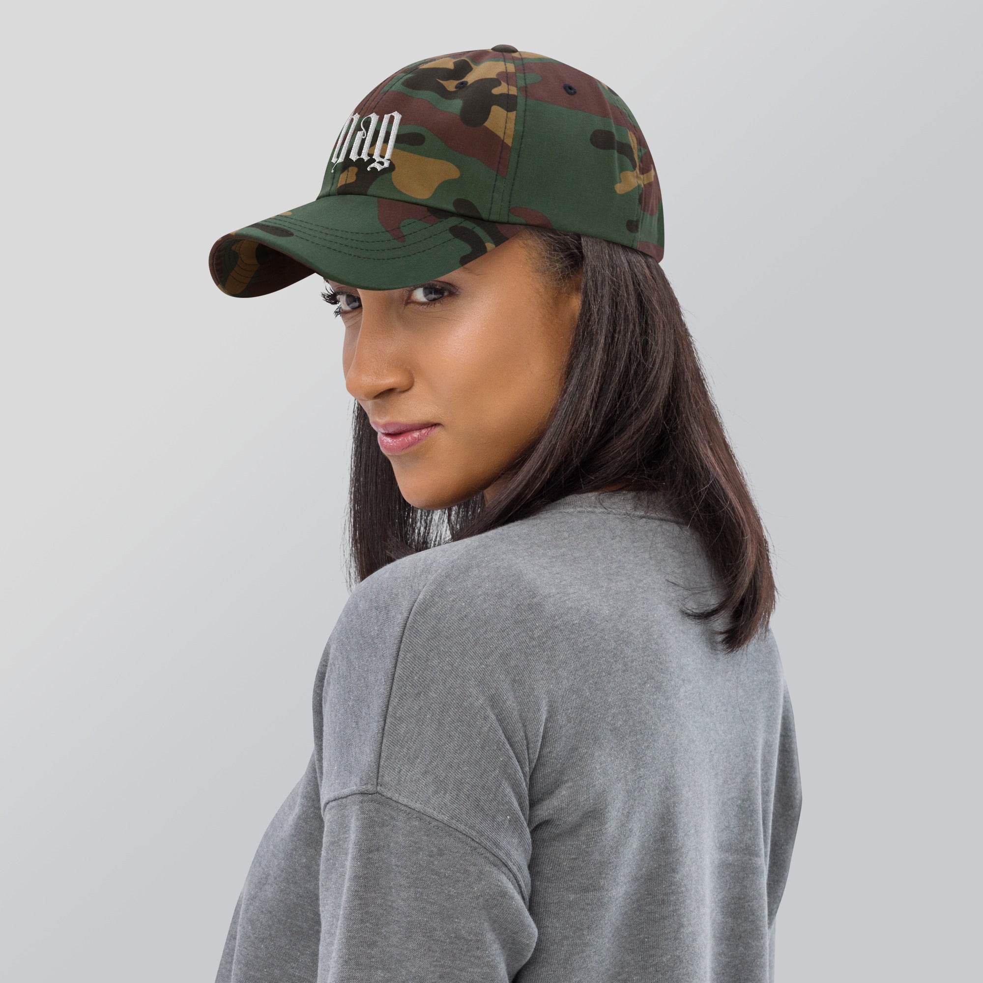 Black dad hat embroidered with the word ‘HAG’ in ornate vintage gothic lettering. Alternative fashion accessory with queer streetwear aesthetic, witchy fashion, sarcastic humor, feminist style, indie fashion, spooky cute apparel, gothic embroidery, punk inspired streetwear, adjustable baseball cap, casual everyday alternative outfit, internet humor fashion, artsy accessory, and edgy statement hat for concerts, festivals, casual wear, and alternative wardrobes.