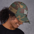 Black dad hat embroidered with the word ‘HAG’ in ornate vintage gothic lettering. Alternative fashion accessory with queer streetwear aesthetic, witchy fashion, sarcastic humor, feminist style, indie fashion, spooky cute apparel, gothic embroidery, punk inspired streetwear, adjustable baseball cap, casual everyday alternative outfit, internet humor fashion, artsy accessory, and edgy statement hat for concerts, festivals, casual wear, and alternative wardrobes.
