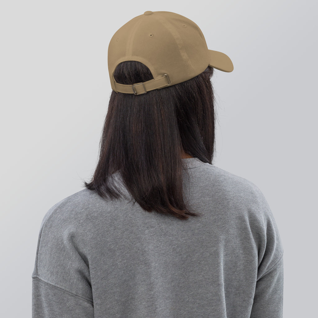 Black dad hat embroidered with the word ‘HAG’ in ornate vintage gothic lettering. Alternative fashion accessory with queer streetwear aesthetic, witchy fashion, sarcastic humor, feminist style, indie fashion, spooky cute apparel, gothic embroidery, punk inspired streetwear, adjustable baseball cap, casual everyday alternative outfit, internet humor fashion, artsy accessory, and edgy statement hat for concerts, festivals, casual wear, and alternative wardrobes.