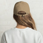 Black dad hat embroidered with the word ‘HAG’ in ornate vintage gothic lettering. Alternative fashion accessory with queer streetwear aesthetic, witchy fashion, sarcastic humor, feminist style, indie fashion, spooky cute apparel, gothic embroidery, punk inspired streetwear, adjustable baseball cap, casual everyday alternative outfit, internet humor fashion, artsy accessory, and edgy statement hat for concerts, festivals, casual wear, and alternative wardrobes.