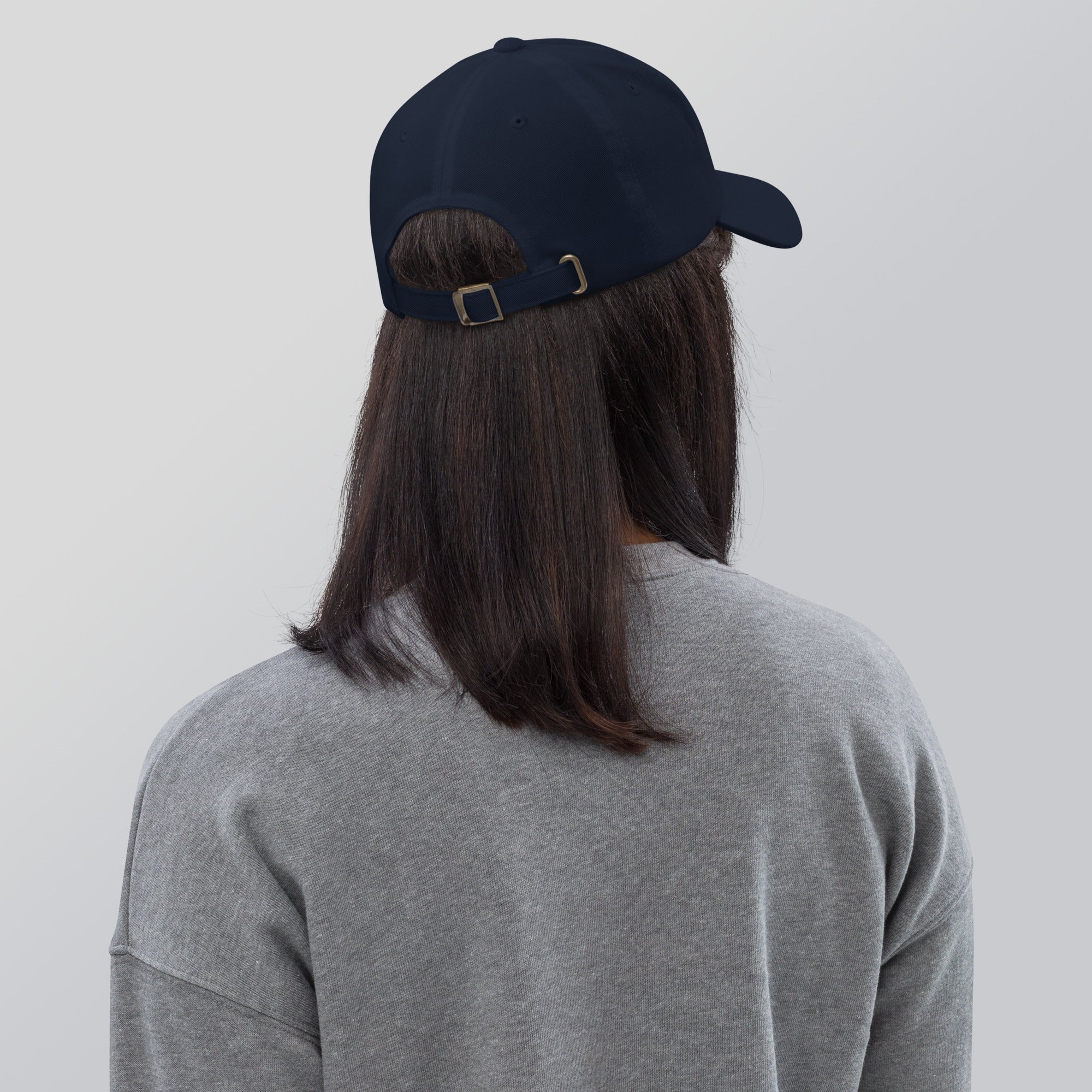Black dad hat embroidered with the word ‘HAG’ in ornate vintage gothic lettering. Alternative fashion accessory with queer streetwear aesthetic, witchy fashion, sarcastic humor, feminist style, indie fashion, spooky cute apparel, gothic embroidery, punk inspired streetwear, adjustable baseball cap, casual everyday alternative outfit, internet humor fashion, artsy accessory, and edgy statement hat for concerts, festivals, casual wear, and alternative wardrobes.
