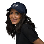 Black dad hat embroidered with the word ‘HAG’ in ornate vintage gothic lettering. Alternative fashion accessory with queer streetwear aesthetic, witchy fashion, sarcastic humor, feminist style, indie fashion, spooky cute apparel, gothic embroidery, punk inspired streetwear, adjustable baseball cap, casual everyday alternative outfit, internet humor fashion, artsy accessory, and edgy statement hat for concerts, festivals, casual wear, and alternative wardrobes.