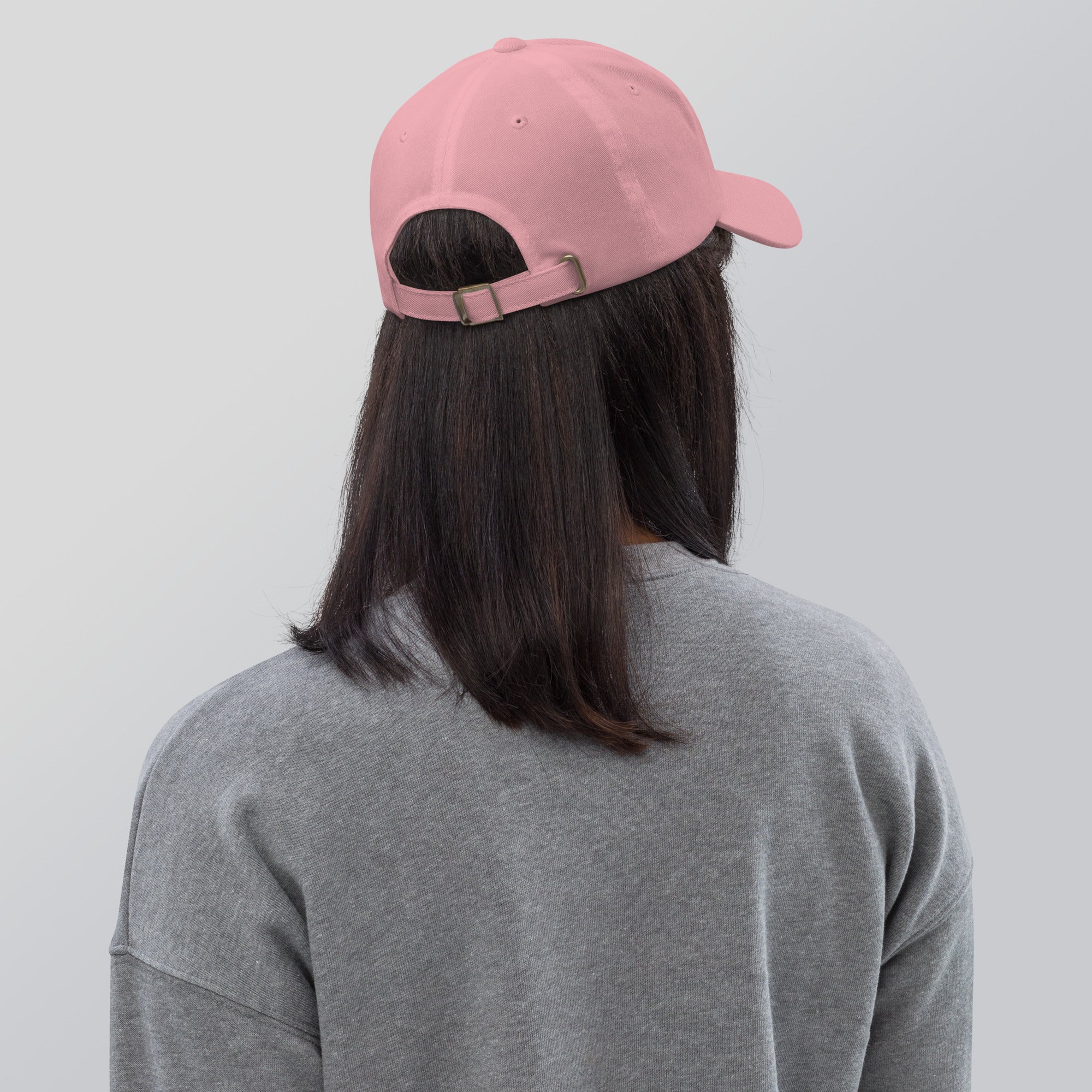 Black dad hat embroidered with the word ‘HAG’ in ornate vintage gothic lettering. Alternative fashion accessory with queer streetwear aesthetic, witchy fashion, sarcastic humor, feminist style, indie fashion, spooky cute apparel, gothic embroidery, punk inspired streetwear, adjustable baseball cap, casual everyday alternative outfit, internet humor fashion, artsy accessory, and edgy statement hat for concerts, festivals, casual wear, and alternative wardrobes.