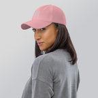 Black dad hat embroidered with the word ‘HAG’ in ornate vintage gothic lettering. Alternative fashion accessory with queer streetwear aesthetic, witchy fashion, sarcastic humor, feminist style, indie fashion, spooky cute apparel, gothic embroidery, punk inspired streetwear, adjustable baseball cap, casual everyday alternative outfit, internet humor fashion, artsy accessory, and edgy statement hat for concerts, festivals, casual wear, and alternative wardrobes.