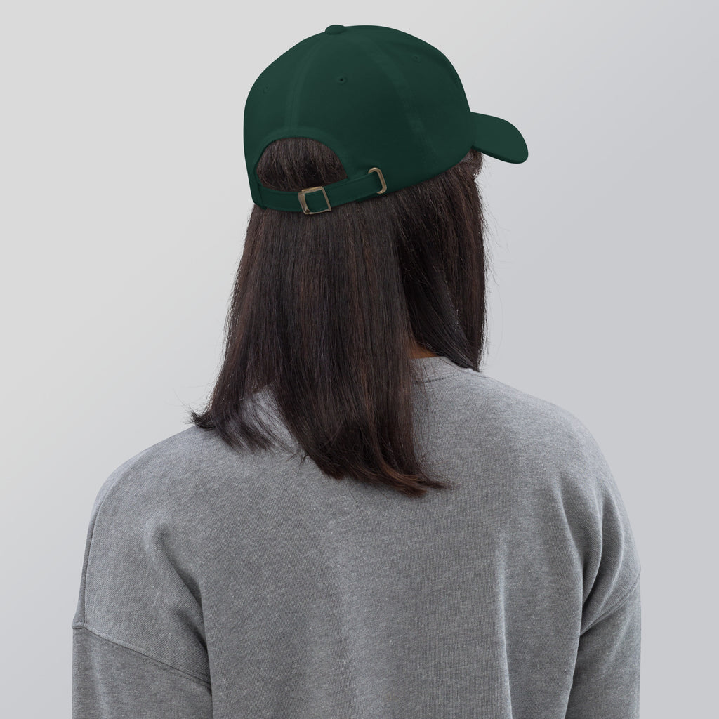 Black dad hat embroidered with the word ‘HAG’ in ornate vintage gothic lettering. Alternative fashion accessory with queer streetwear aesthetic, witchy fashion, sarcastic humor, feminist style, indie fashion, spooky cute apparel, gothic embroidery, punk inspired streetwear, adjustable baseball cap, casual everyday alternative outfit, internet humor fashion, artsy accessory, and edgy statement hat for concerts, festivals, casual wear, and alternative wardrobes.