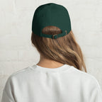 Black dad hat embroidered with the word ‘HAG’ in ornate vintage gothic lettering. Alternative fashion accessory with queer streetwear aesthetic, witchy fashion, sarcastic humor, feminist style, indie fashion, spooky cute apparel, gothic embroidery, punk inspired streetwear, adjustable baseball cap, casual everyday alternative outfit, internet humor fashion, artsy accessory, and edgy statement hat for concerts, festivals, casual wear, and alternative wardrobes.