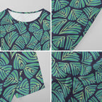 Short sleeve dress featuring the Frondescence pattern with layered tropical foliage in deep green botanical tones and an all-over nature-inspired print. Flowy casual dress with earthy jungle aesthetic, maximalist fashion, indie streetwear, botanical artwork, expressive queer friendly style, artsy everyday wear, and retro-inspired tropical clothing perfect for vacations, brunch, festivals, casual outings, and comfortable everyday alternative fashion.