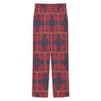 Dress pants featuring the Petalburst Tile in Midnight Fiesta pattern with bold floral-inspired geometric shapes in rich midnight blue, orange, pink, and cream tones. Statement trousers with retro maximalist aesthetic, indie streetwear, mod inspired fashion, expressive queer friendly style, artsy alternative clothing, colorful geometric pattern, and bold patterned pants perfect for concerts, parties, festivals, creative workwear, nightlife, and everyday alternative fashion.