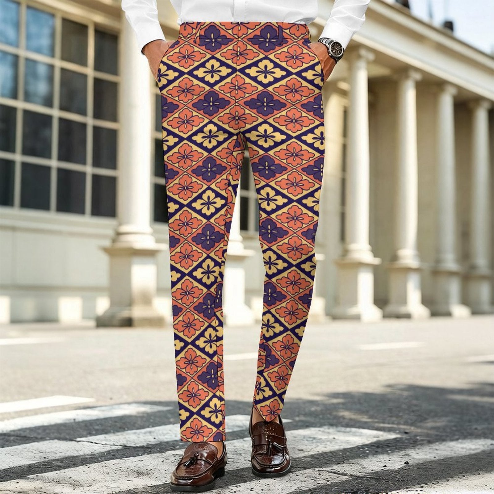 Dress pants featuring the Bloomgrid in Disco Dahlia pattern with vibrant pink, orange, and cream geometric floral shapes in a retro-inspired all-over print. Statement trousers with maximalist fashion aesthetic, mod inspired style, indie streetwear, expressive queer friendly fashion, colorful geometric artwork, artsy alternative clothing, retro resort vibe, and bold patterned pants perfect for concerts, festivals, nightlife, creative workwear, parties, and everyday alternative fashion.